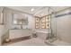 Modern bathroom featuring double sink vanity, glass shower and soaker tub at 3060 Grand Bay Blvd # 154, Longboat Key, FL 34228