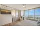 Beautifully lit main bedroom with balcony access, and stunning ocean views at 3060 Grand Bay Blvd # 154, Longboat Key, FL 34228