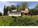 Entrance sign to Esplanade Golf & Country Club with lush landscaping at 5116 Tivoli Run, Bradenton, FL 34211