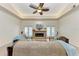 Bright living room featuring a fireplace and French doors leading to the backyard at 5708 39Th Street E Cir, Bradenton, FL 34203