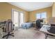 Bright bedroom featuring a work station, double doors and a cozy bed at 7460 Monte Verde, Sarasota, FL 34238