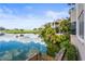 Beautiful waterfront view featuring a golf course and luxury homes with lush landscaping at 7460 Monte Verde, Sarasota, FL 34238
