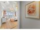 Charming bedroom with a four-poster bed, water views, and pastel decor at 8501 Midnight Pass Rd, Sarasota, FL 34242