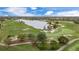 Expansive golf course with lush green fairways, scenic water features, and mature trees at 15608 Leven Links Pl, Lakewood Ranch, FL 34202