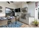 Outdoor kitchen boasts a stainless steel grill and prep area for al fresco dining at 15608 Leven Links Pl, Lakewood Ranch, FL 34202