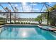 Gorgeous pool and spa overlooking serene lake and golf course views at 15608 Leven Links Pl, Lakewood Ranch, FL 34202
