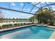 Beautiful pool with attached spa offering stunning views of the lake and golf course at 15608 Leven Links Pl, Lakewood Ranch, FL 34202