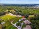 A single story home on a large lot surrounded by green space and a long winding driveway at 1817 Curry Ave # 57, Nokomis, FL 34275