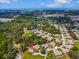 Lovely aerial view of the home, showcasing nearby lake, trees, and neighborhood at 1817 Curry Ave # 57, Nokomis, FL 34275