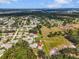 Aerial shot of property showcasing surrounding landscape and neighborhood, marked by red pin at 1817 Curry Ave # 57, Nokomis, FL 34275