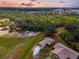Single-story home on a large lot surrounded by green space and a long winding driveway at 1817 Curry Ave # 57, Nokomis, FL 34275