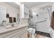 Bathroom featuring a vanity with a sink and a glass-enclosed shower with grab bars at 1817 Curry Ave # 57, Nokomis, FL 34275