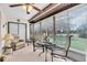 Relaxing sunroom with floor-to-ceiling windows and comfortable seating at 1817 Curry Ave # 57, Nokomis, FL 34275