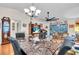 Open concept view of the living room and dining room at 1817 Curry Ave # 57, Nokomis, FL 34275