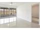 Living room with sliding doors to the outside space at 2782 Woodgate Ln # 18, Sarasota, FL 34231