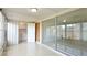 Sunroom with tile flooring and sliding glass doors to the exterior at 2782 Woodgate Ln # 18, Sarasota, FL 34231