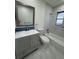 Updated bathroom features new vanity, tiled shower/tub, and modern fixtures at 3813 42Nd W St # 37, Bradenton, FL 34205