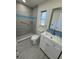 Updated bathroom with tiled walk-in shower and modern vanity at 3813 42Nd W St # 37, Bradenton, FL 34205