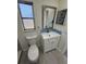 Bright half bathroom featuring an updated vanity and medicine cabinet at 3813 42Nd W St # 37, Bradenton, FL 34205