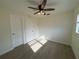 Cozy bedroom with wood-look flooring and modern ceiling fan at 3813 42Nd W St # 37, Bradenton, FL 34205