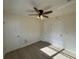 Well-lit bedroom with wood-look flooring and a ceiling fan at 3813 42Nd W St # 37, Bradenton, FL 34205