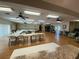 Large common area with tables, chairs, ceiling fans, and access to a library at 3813 42Nd W St # 37, Bradenton, FL 34205