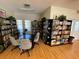 Cozy library featuring bookshelves, a round table, and comfortable seating at 3813 42Nd W St # 37, Bradenton, FL 34205
