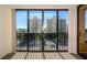 Balcony view of a city skyline and waterway view on a sunny day at 11 Sunset Dr # 406, Sarasota, FL 34236