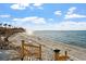 Private beach access is yours with steps to the sand and a sunny shoreline to enjoy the outdoors at 11 Sunset Dr # 406, Sarasota, FL 34236