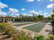 Enjoy bocce ball and tennis courts with a covered picnic area in a landscaped community at 17459 Hickok Belt Loop, Bradenton, FL 34211
