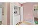 Kitchen nook includes a laundry area and sliding glass door with outside view at 3443 Tallywood Cir # 7061, Sarasota, FL 34237