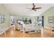 Bright and airy living room with comfortable seating, natural light, and stylish furnishings at 3443 Tallywood Cir # 7061, Sarasota, FL 34237