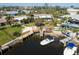 Waterfront home with private dock, boat lift and room to fish or just sit and enjoy the peaceful water at 4419 Mangrove Point Rd, Bradenton, FL 34210