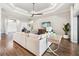 Inviting living room with modern decor, tray ceiling, and hardwood floors at 4745 Benito Ct, Lakewood Ranch, FL 34211