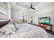 Spacious main bedroom with a tray ceiling, neutral color scheme, and plenty of natural light at 4745 Benito Ct, Lakewood Ranch, FL 34211