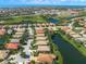 Aerial view of home with a pond view in a community near the water at 531 Latitude Ln, Osprey, FL 34229