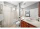 Bright bathroom with updated vanity, fixtures, and a shower-tub combo at 531 Latitude Ln, Osprey, FL 34229