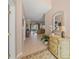 Inviting foyer with tile flooring and decorative accents leading to the living area at 531 Latitude Ln, Osprey, FL 34229