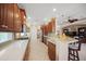 Well-equipped kitchen with updated appliances, ample counter space, and a breakfast bar at 531 Latitude Ln, Osprey, FL 34229
