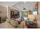 Comfortable living room with stylish furniture, built-in shelving, and natural light at 531 Latitude Ln, Osprey, FL 34229