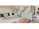 Nicely decorated bedroom featuring white furniture, dresser, and natural lighting from window at 9214 Raes Creek Pl, Palmetto, FL 34221