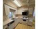 Functional kitchen with plenty of counter space at 1546 Grand Blvd # 108, Sarasota, FL 34232