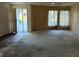 Bright living room featuring an exterior view and lots of natural light at 1546 Grand Blvd # 108, Sarasota, FL 34232