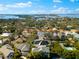 Expansive aerial shot of the house in a desirable location, surrounded by trees and waterways at 1746 Stapleton St, Sarasota, FL 34239