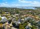 Scenic aerial view of the home nestled within a lush, green neighborhood near a tranquil bay at 1746 Stapleton St, Sarasota, FL 34239