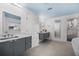 Contemporary bathroom featuring double vanities and walk-in shower at 1746 Stapleton St, Sarasota, FL 34239