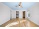 Bright bedroom with hardwood floors, a closet, and natural light from the window at 1746 Stapleton St, Sarasota, FL 34239