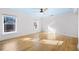 Bright bedroom featuring gleaming hardwood floors and ample natural light at 1746 Stapleton St, Sarasota, FL 34239