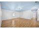 Spacious bonus room featuring hardwood floors, recessed lighting, and plenty of room for entertaining and relaxation at 1746 Stapleton St, Sarasota, FL 34239
