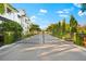 Elegant gated entrance to the 'Grand D'Abre' community, surrounded by lush greenery at 1746 Stapleton St, Sarasota, FL 34239